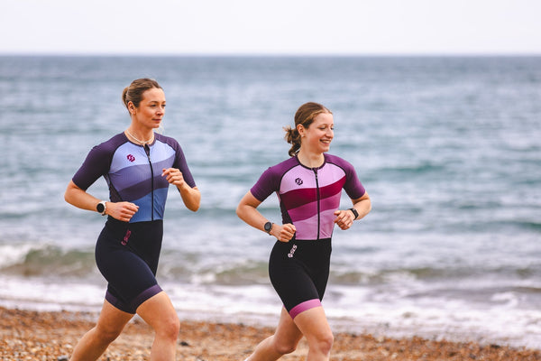 Triathlete swimming, cycling, and running to demonstrate the muscles used in triathlon